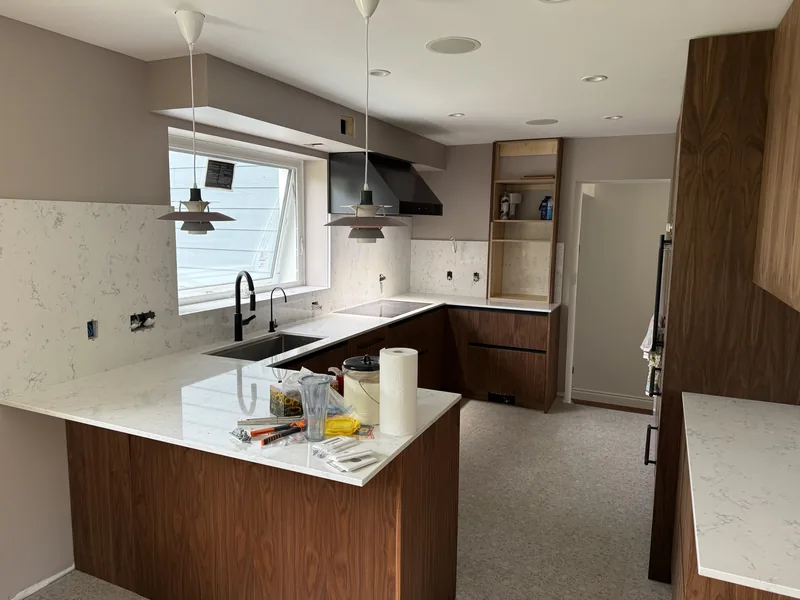 Kitchen counters and full-height backsplash